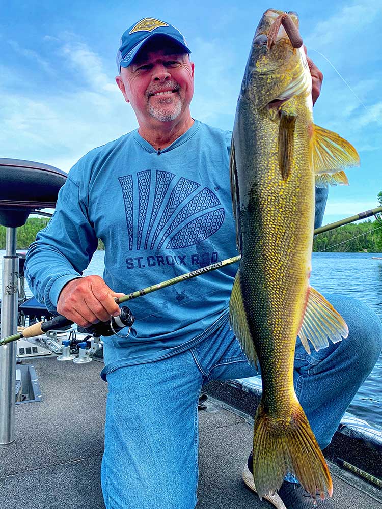 angler fishing walleye