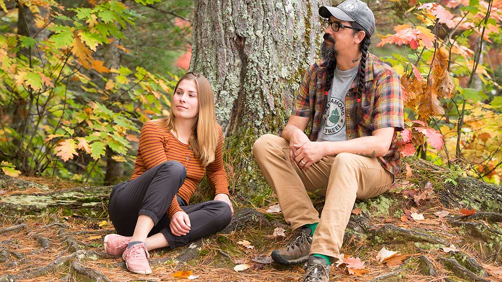 walk among the trees people sitting