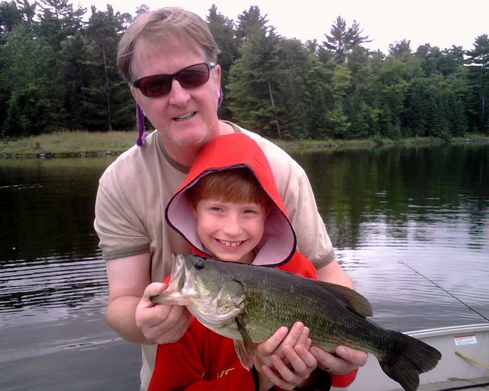 father and son fishing smallmouth bass