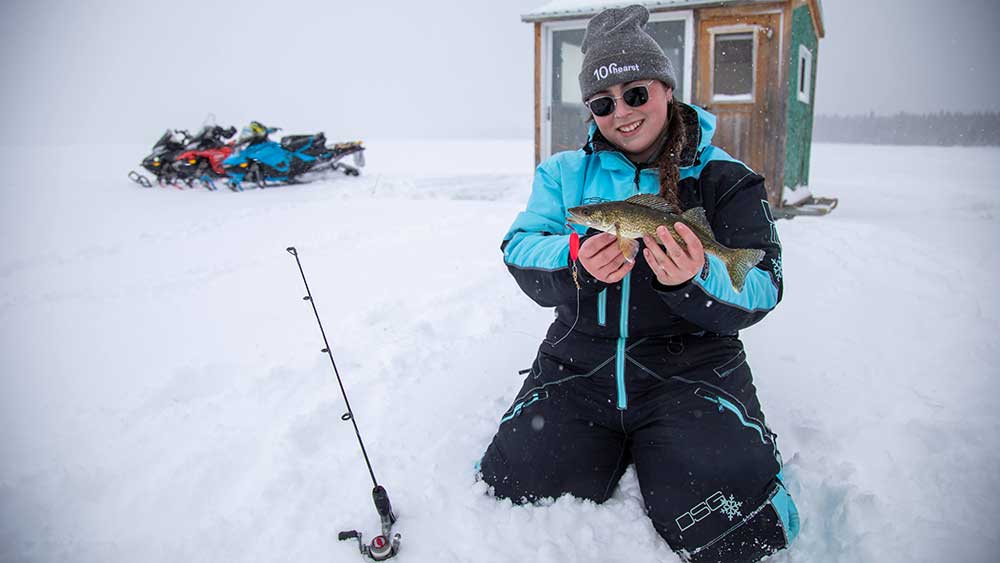 ice fishing by snowmobile