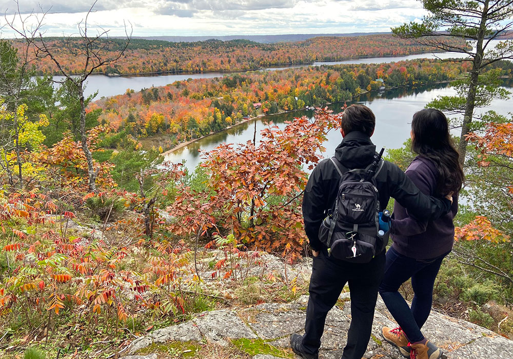 hikers overlooking lake