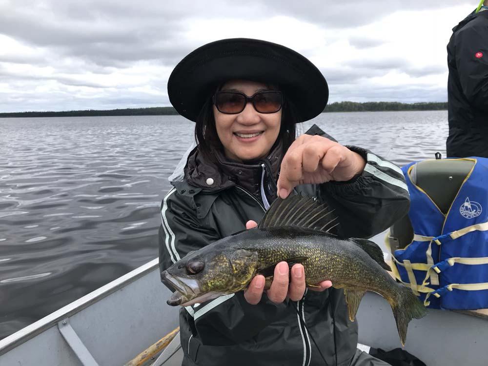 angler fishing ontario walleye