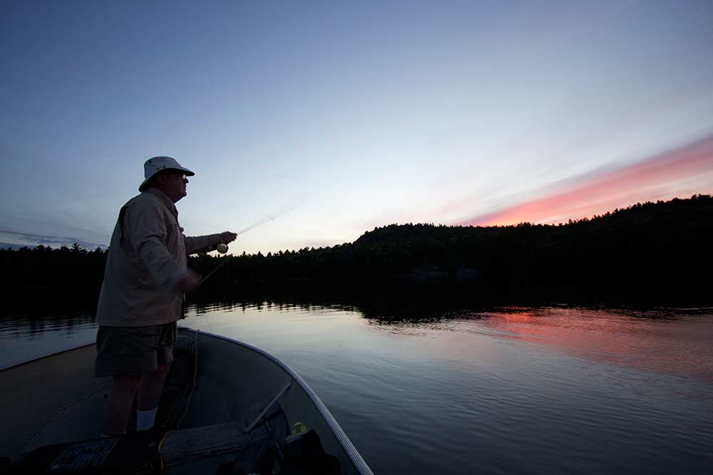 casting from a fishing boat