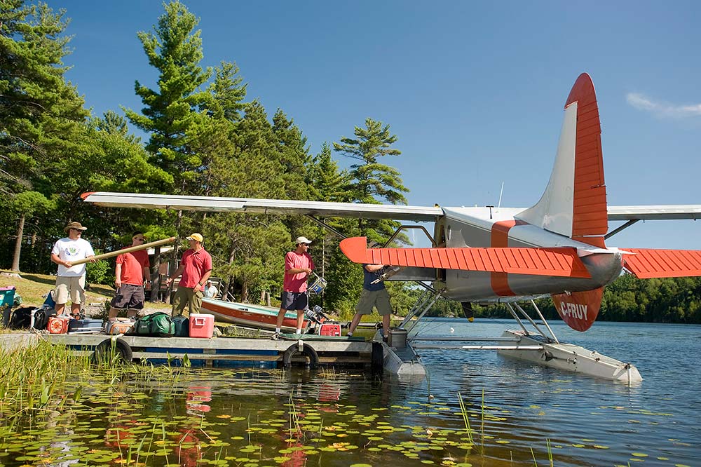 unloading gear from a bushplane