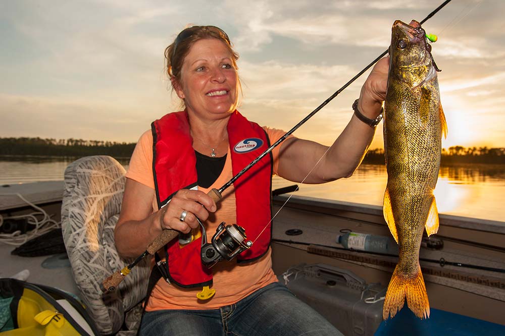 woman angler fishing walleye