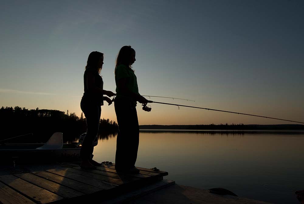 women anglers silhouette